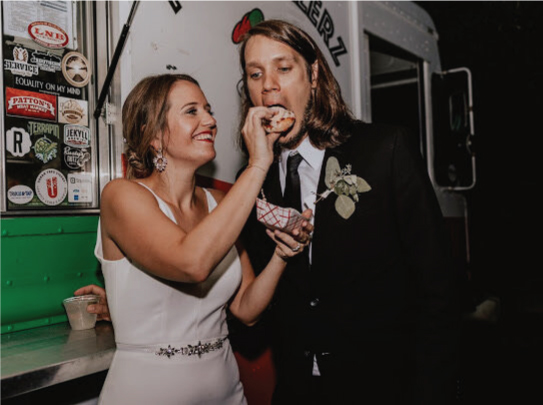 Bride feeding the Groom